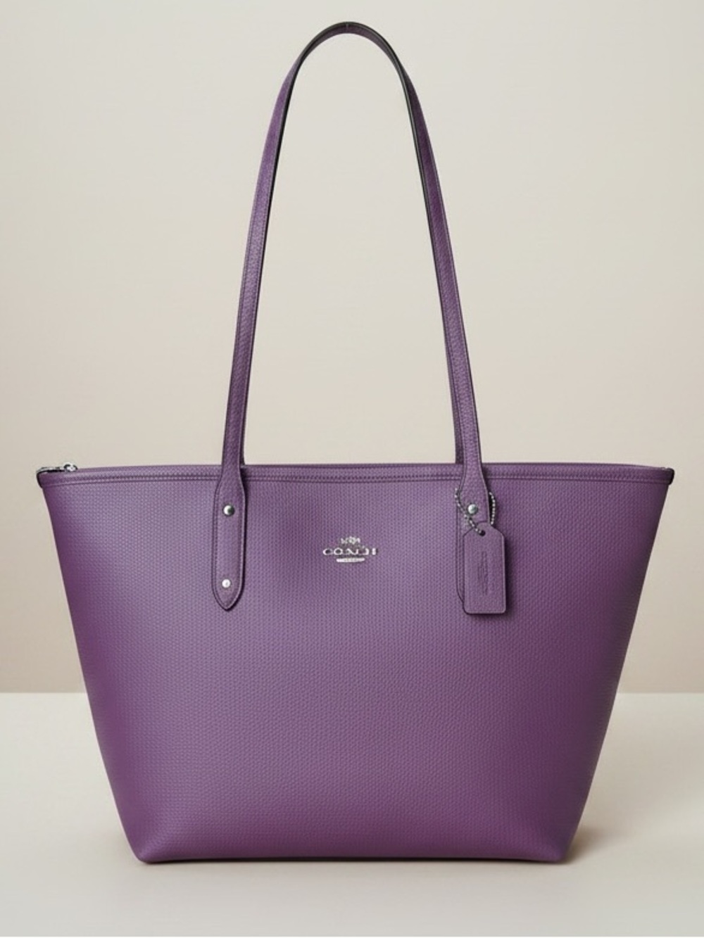Coach City Zip Tote. a versatile handbag crafted from crossgrain leather.